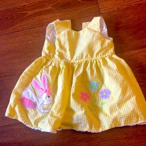 Girls yellow dress with bunnies. Sleeve-less 2T. Worn once.